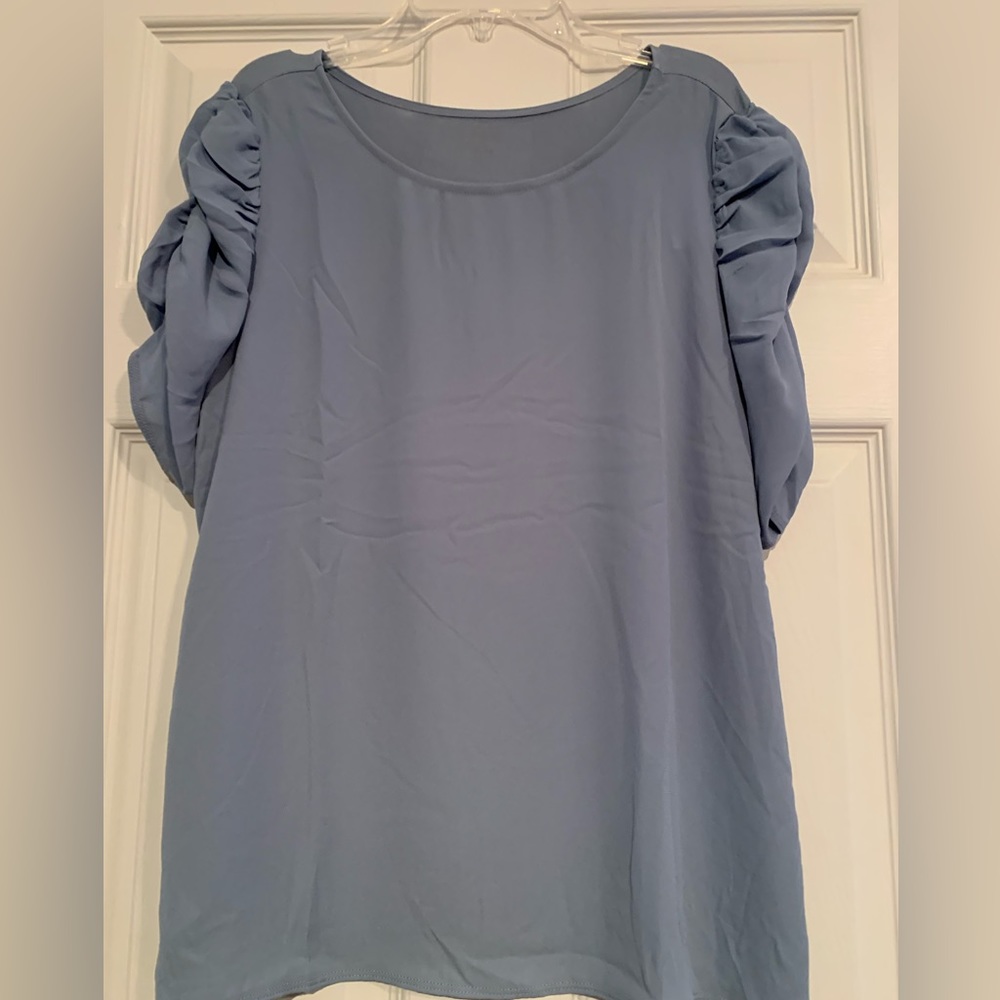 Loft blouse. Cute, unique sleeves. Color: blue